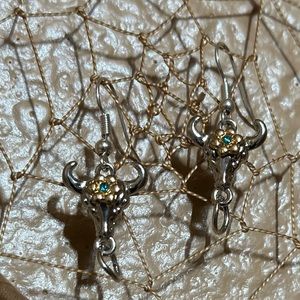 Bull faced earrings with colorful eyes